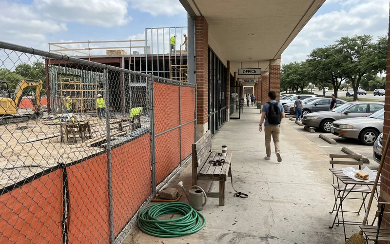 Phased commercial court construction with half the facility still open to users