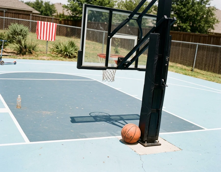 Finished goal with pole safety padding on a newly surfaced court